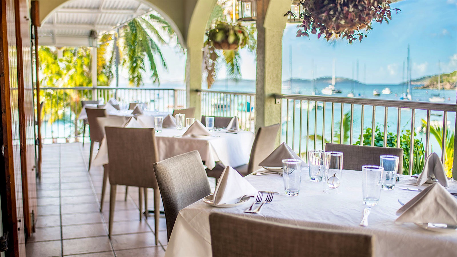 Tables set outside on a terrace at the Terrace Restaurant